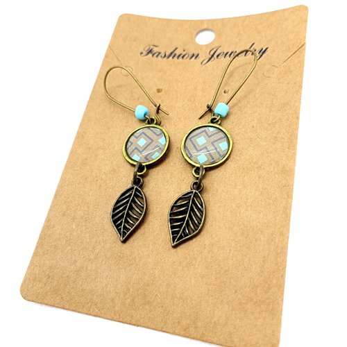 Boucles d’oreilles bronze *jolis motifs* avec cabochons en résine