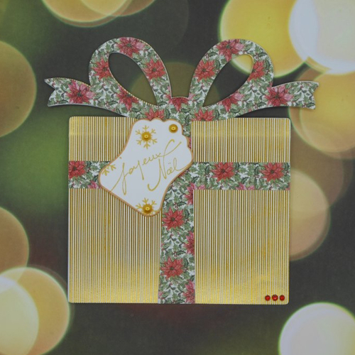Carte de voeux joyeux noël en forme de cadeau noeud fleuri pour offrir une carte cadeau fait main