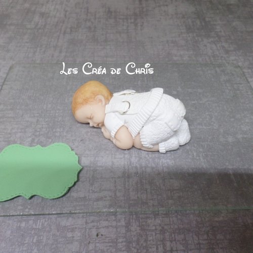 Créations sur commande d'un lot de bébés fimo garçon tenue de baptême.