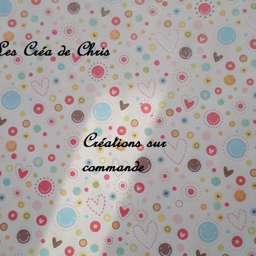 Création sur commande d'une plaque à accrocher et son bébé tenue de baptême.