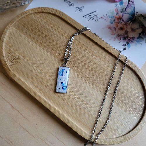 Collier en acier inoxydable avec pendentif papillon