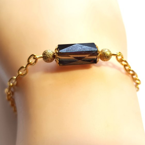 Bracelet perle en verre noir et transparent à facette, chaîne d’extension, goutte, fermoir mousqueton en métal doré