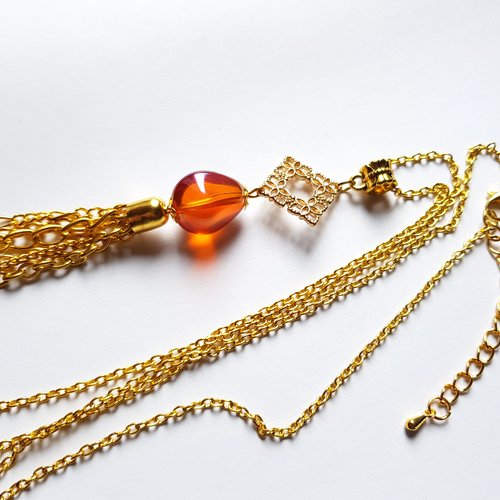 Collier sautoir grosse perle ovale en verre orange avec reflets, connecteur, coupelle, bélière, chaîne, fermoir, en métal doré