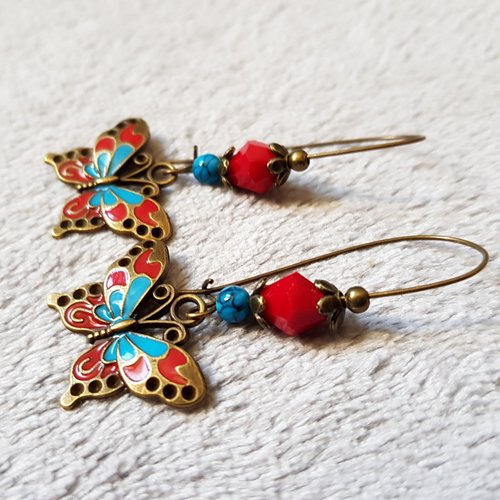 Boucle d'oreille papillon émaillé rouge, bleu, perles en verre, crochet en métal bronze