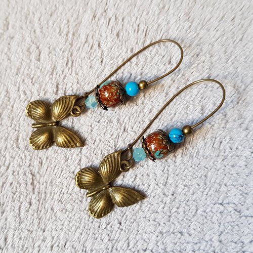 Boucle d'oreille papillon, perles en verre marron, bleu, crochet en métal bronze