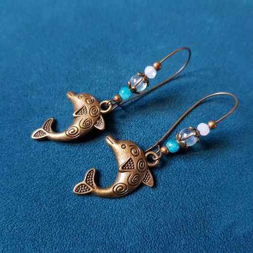 Boucle d'oreille dauphin, perles en verre bleu, blanche, transparente, métal bronze