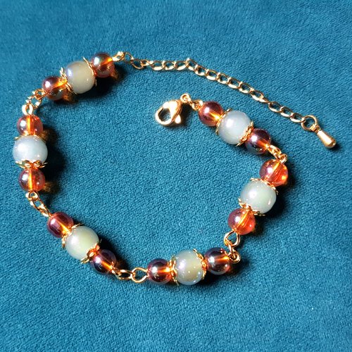 1 bracelet perles en verre bleu gris, transparent, orange, chaîne d’extension, fermoir le tout en acier inoxydable doré