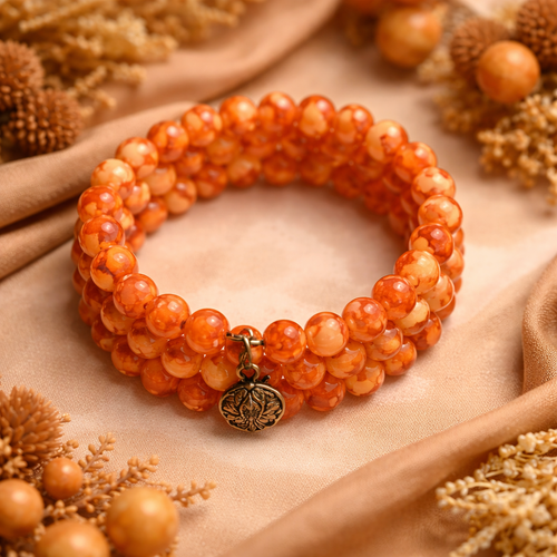 Bracelet multi rangs en perles orange – breloques tortue & poisson