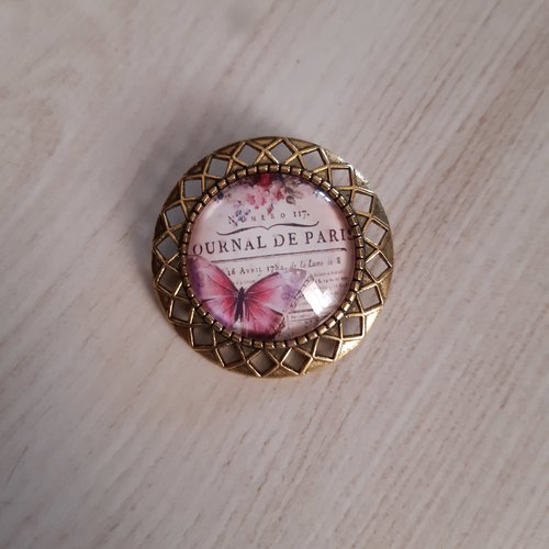 Broche cabochon de verre de 25mm journal de paris
