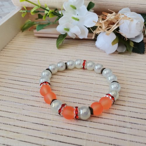 Bracelet fil élastique perles en verre beige et orange