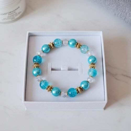 Bracelet fil élastique perles en verre bleu