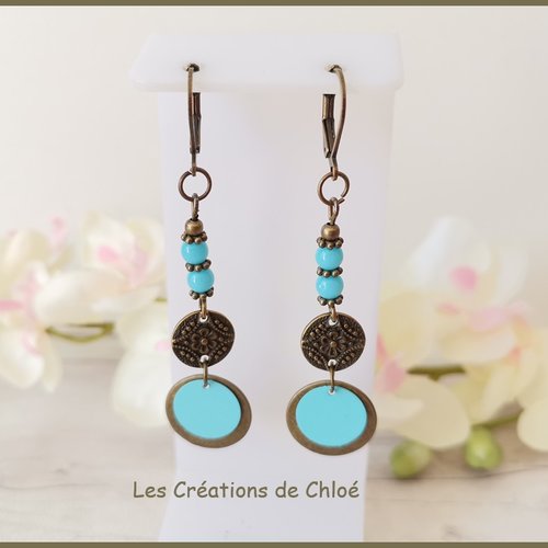 Boucles d'oreilles apprêts bronze et sequin bleu