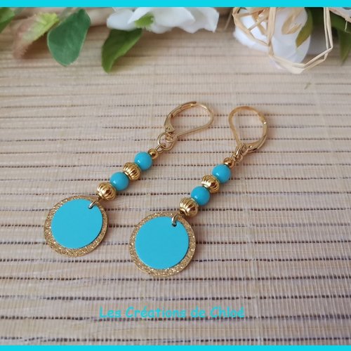 Boucles d'oreilles acier inoxydable doré et pendentif bleu