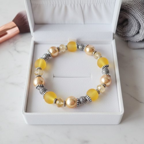 Bracelet fil élastique perles jaune et moutarde