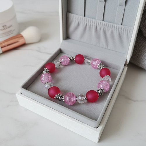 Bracelet fil élastique perles prune et rose