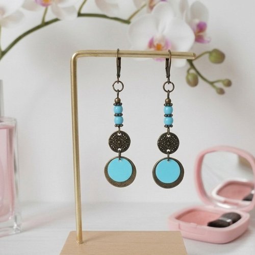Boucles d'oreilles apprêts bronze et sequin bleu