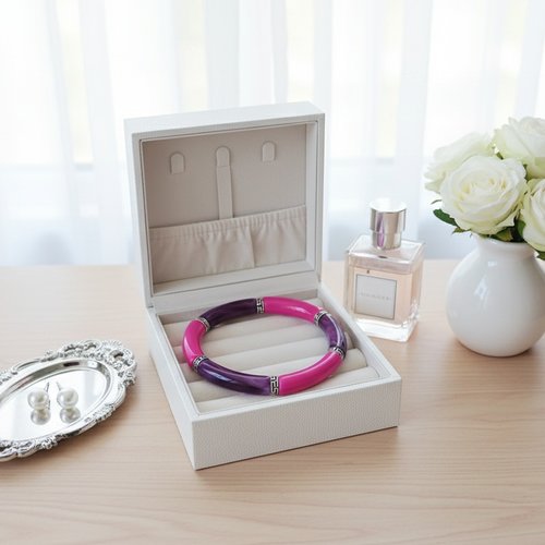 Bracelet perles tube incurvées