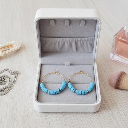 Boucles d'oreilles créoles dorées acier inoxydable et perles heishi