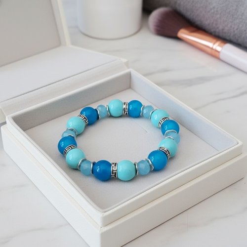 Bracelet fil élastique perles en verre bleu