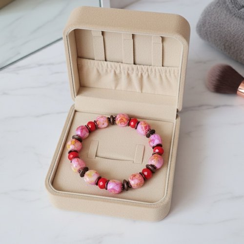 Bracelet fil élastique perles en verre rose et rouge