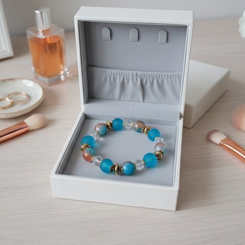 Bracelet fil élastique perles en verre bleu et orange