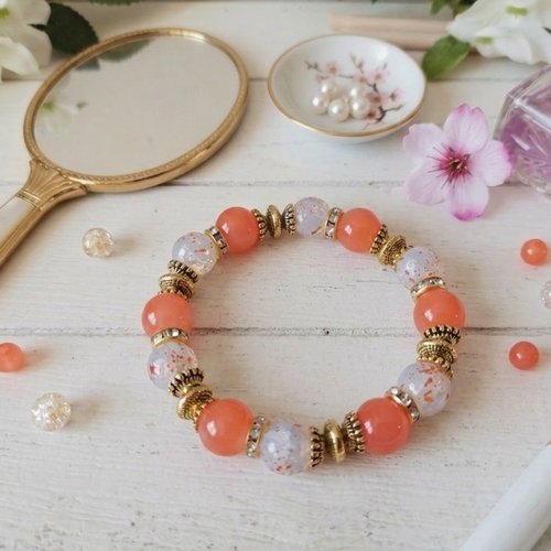 Bracelet fil élastique perles imitation jade et craquelé orange