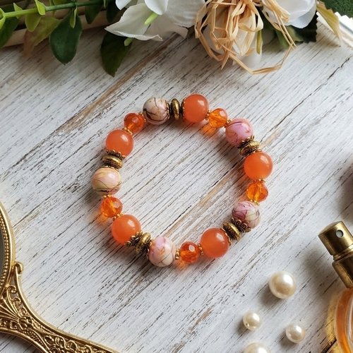 Bracelet fil élastique perles en verre orange et tréfilé