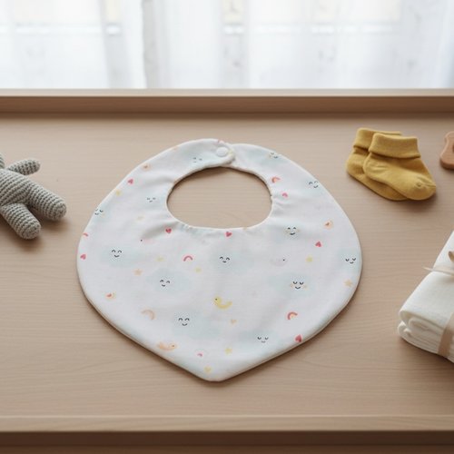 Bavoir bébé coton motif nuages et nid d'abeilles blanche