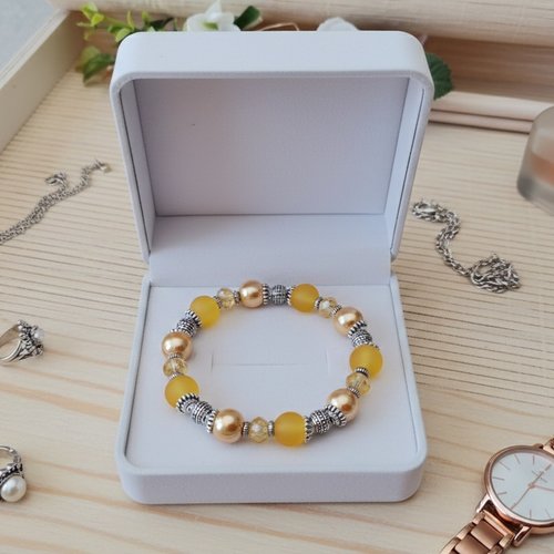 Bracelet fil élastique perles jaune et moutarde