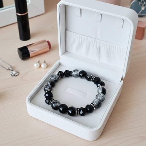 Bracelet perles en verre craquelé et à facettes noires