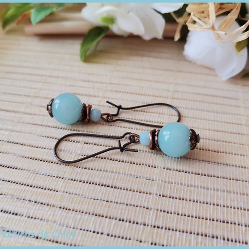 Boucles d'oreilles apprêts cuivre et perles en verre bleu ciel
