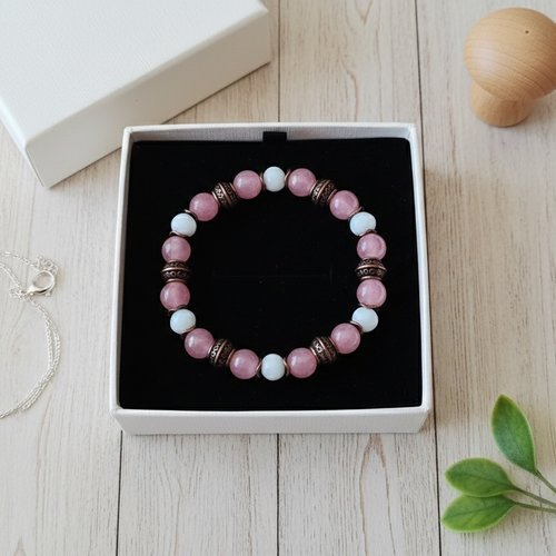 Bracelet fil élastique perles en verre blanche et vieux rose
