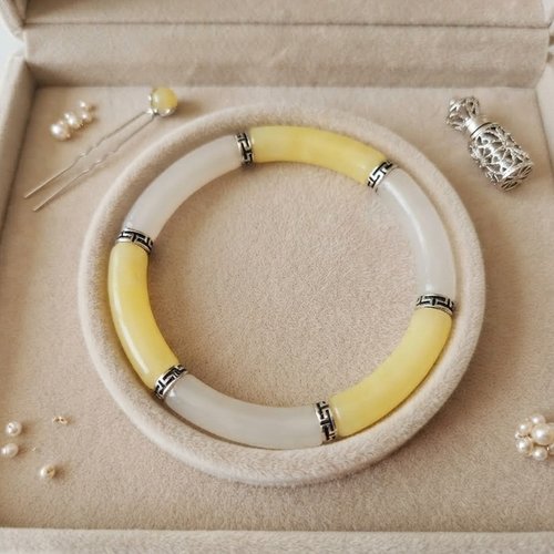 Bracelet perles tube incurvées