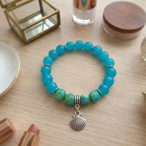 Bracelet fil élastique perles en verre turquoise et breloque
