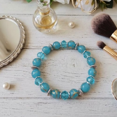 Bracelet fil élastique perles en verre tréfilé doré