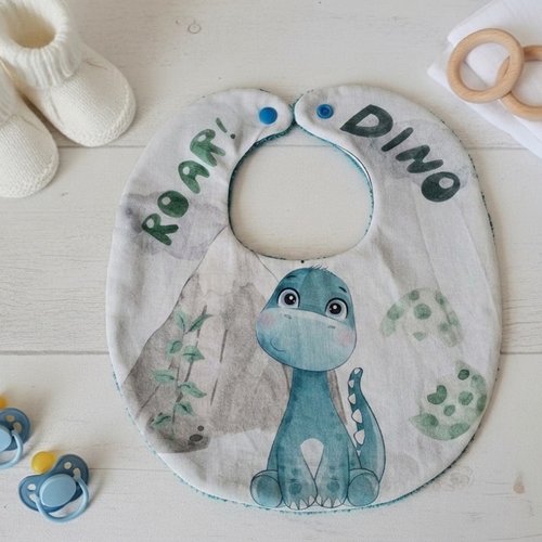 Bavoir bébé coton imprimé dinosaure et éponge turquoise