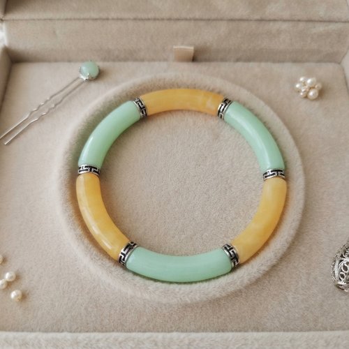 Bracelet perles tube incurvées