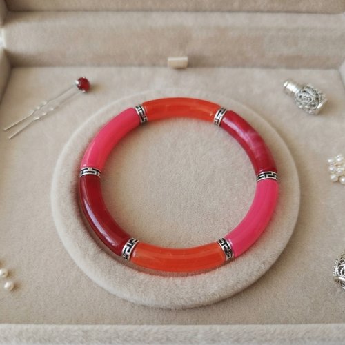 Bracelet perles tube incurvées