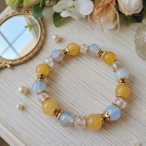Bracelet perles en verre jaune et apprêts dorés