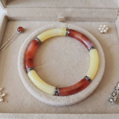 Bracelet perles tube incurvées