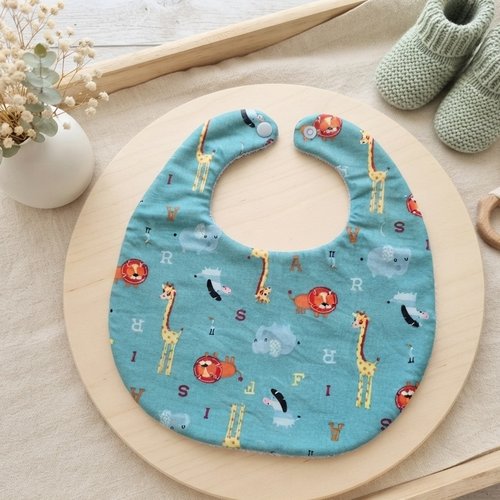 Bavoir bébé coton bleu motif animaux et éponge bleue