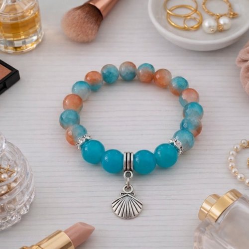 Bracelet fil élastique perles bleu et orange breloque coquillage