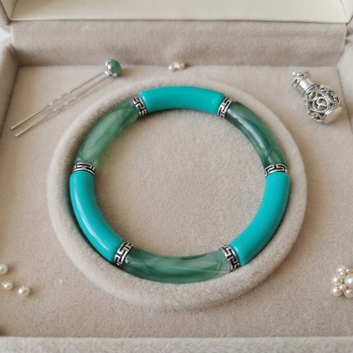 Bracelet perles tube incurvées