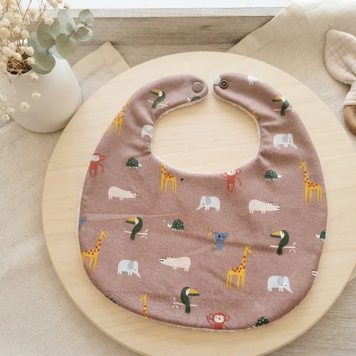 Bavoir bébé coton marron motifs animaux et éponge beige
