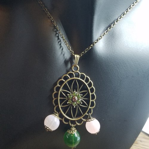 Pendentif lotus en verre et bronze, strass et perles de verre rose et vert