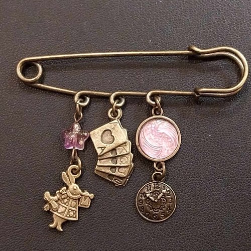 Broche ,épingle bronze thème "alice"