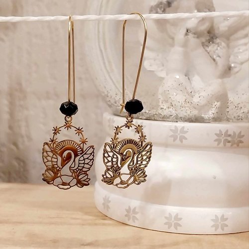 Boucles en acier inoxydable "le chant des cygnes"