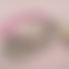 Papillon - bracelet fantaisie en perles synthétiques roses