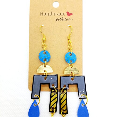 Boucles d'oreilles asymétriques