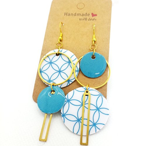 Boucles d'oreilles asymétriques en papier résiné